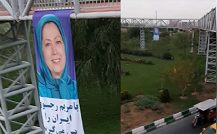 Poster of Maryam Rajavi hung by MEK resistance unit