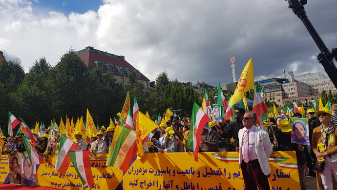 Iranian Resistance supporters rally in Stockholm, Sweden, to celebrate the historic court ruling against Iranian regime criminal Hamid Noury