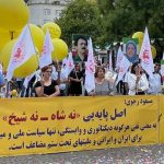 Freedom loving Iranians and supporters of the Iranian opposition PMOIMEK rallying in Cologne, Germany, and condemning the mullahs regime ruling Iran – September 3, 2022