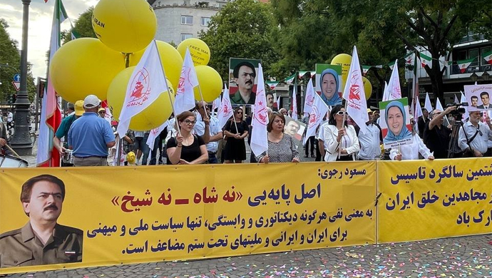 Freedom loving Iranians and supporters of the Iranian opposition PMOIMEK rallying in Cologne, Germany, and condemning the mullahs regime ruling Iran – September 3, 2022