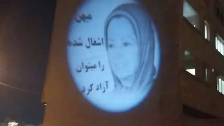 MEK Resistance Units projected a large image of Iranian opposition coalition NCRI President-elect Maryam Rajavi on a building in Dehdasht, southwest Iran – March 25, 2023