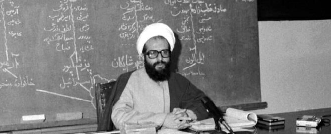 Mohammad Mohammadi Reyshahri, the first Minister of Intelligence of the Iranian regime, sits in front of a blackboard displaying a chart outlining the ministry’s targets